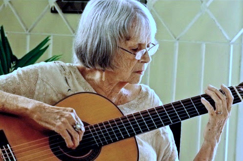 Marta Valdez playing guitar